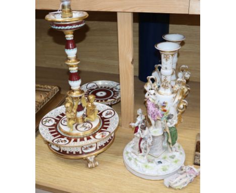A French ceramic lamp, decorated with German figurines representing the Arts, a matching tazza, a figure and pair of vases ta