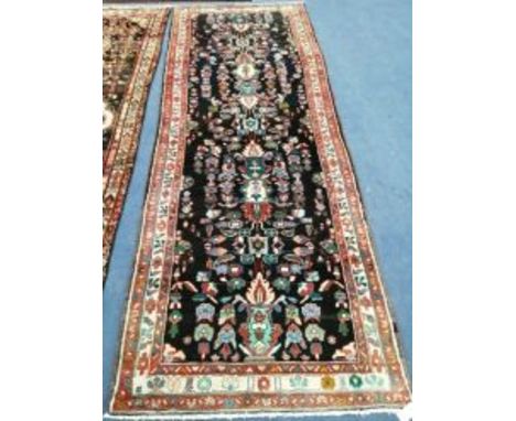 A Hamadan carpet 316 x 107cm