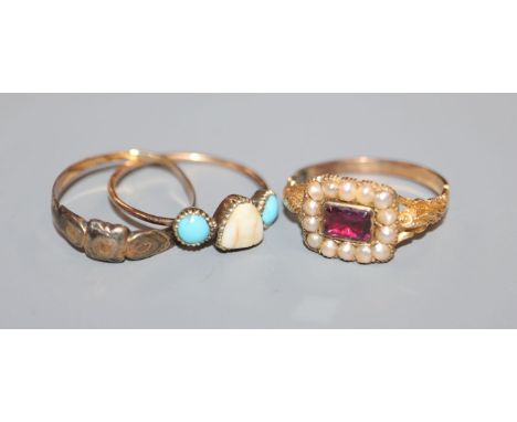 An early Victorian yellow metal, foil backed garnet? and split pearl ring and two other rings.