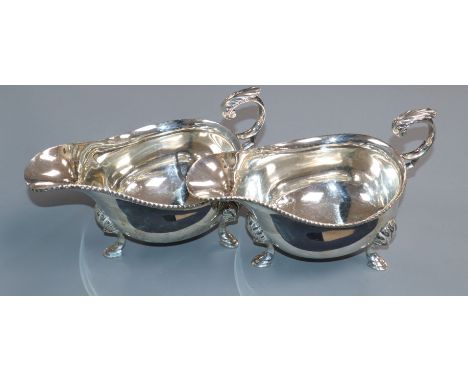 A pair of George V silver sauceboats, George Howson Sheffield, 1931, 17.5 oz.