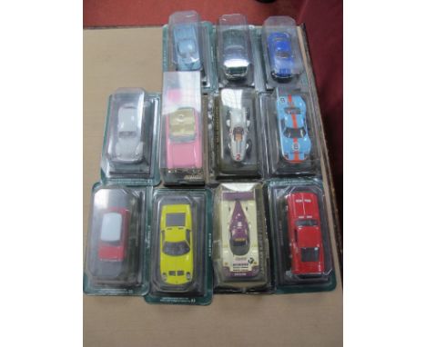 Approximately Eleven 1:43rd Scale Diecast Model Race and Road Cars, to include Mini Cooper, Jaguar E Type, Ford G.T, etc, all