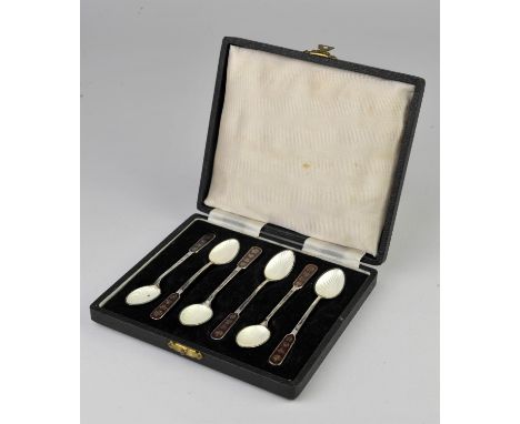 Danish silver and enamel spoons with red and gold enamel terminals and white enamel bowls by ELA with later import marks, cas