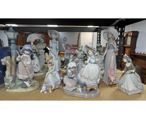Eleven Lladro figures and figural groups to include a girl standing under a lamp post, a girl at a hand pump, a girl on the p
