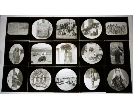 Collection of approximately 75 photographic magic lantern slides. Depicting African / Middle Eastern tribes. In wooden slide 