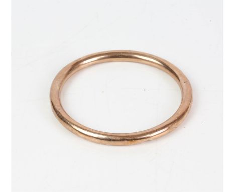 A 5mm bangle, set in 9ct rose gold, 7.5cm outside diameterCondition Report:  Gross weight 12.3 gramsSigns of wear and use, wi