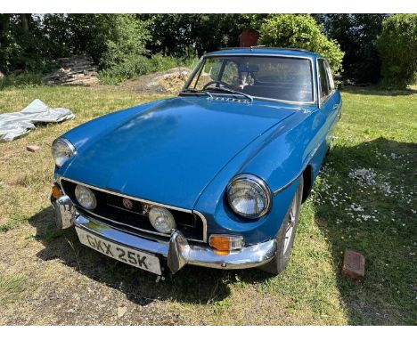 1972 MGB GT, 1798cc petrol, reg. no. GKX 25K, finished in blue with a tan vinyl interior. This more desirable chrome bumper v