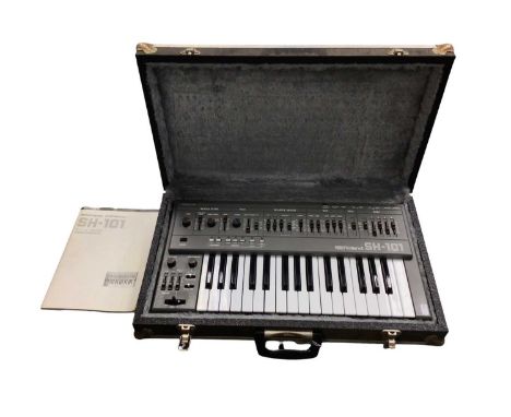 Roland Monophonic Synthesizer SH-101 in fitted travel case with owner's manual