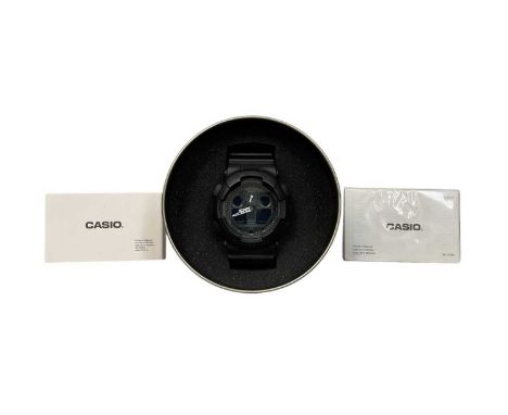 Casio G-Shock with black dial on black rubber strap, in the original box with warranty card and users guide Model Number 5081