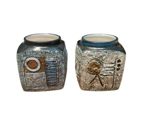 Two Troika pottery vases with abstract decoration on blue ground, 9cm highBoth in very good condition with no chips or cracks