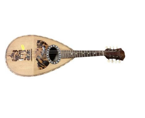 Italian mandolin with 'Stridente' label, mother of pearl inlaid decoration