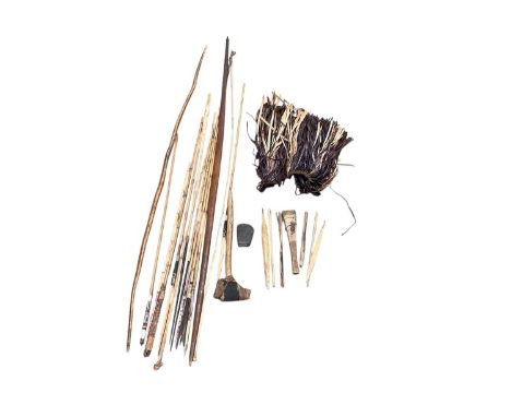 Two tribal bows with selection of arrows, axe head and spear heads, male tribal covering Purchased from National People of Me