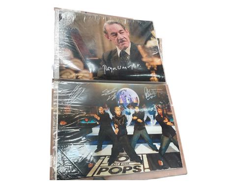 Two albums of celebrity signed photographs plus some unsigned to include Dame Judy Dench, Arthur Askey, Noelle Gordon, Sporti