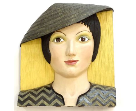 Caroline C Matthaei (20thC).  Thea, carved and painted limewood, signed and titled verso, 41cm high.Provenance: From the Esta
