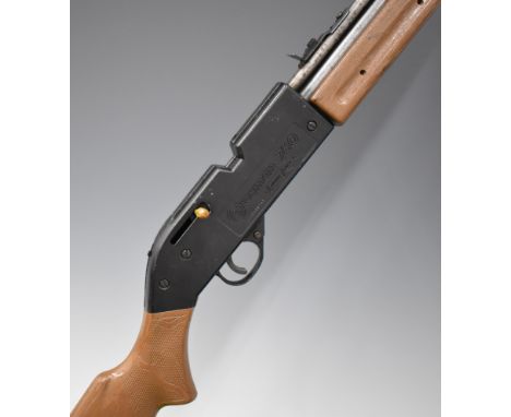 Crosman 760 .177 air rifle with faux wooden semi-pistol grip and forend and adjustable sights, serial number 0679G08745.&nbsp