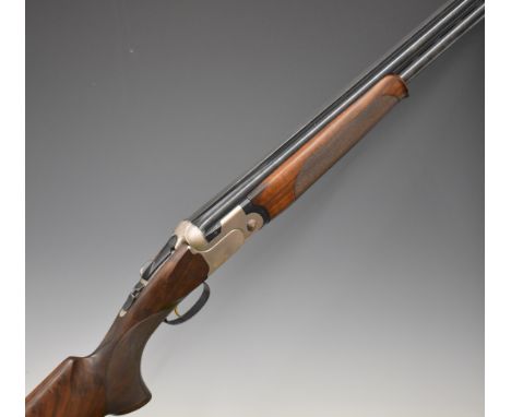 Beretta DT10 Trident Sporting 12 bore over and under ejector shotgun with gold named locks and underside, chequered semi-pist