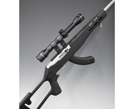 Ruger Model 10/22 .22 semi-automatic rifle with composite skeleton stock, extended magazine, Tasco 4x32 scope and 18.5 inch b