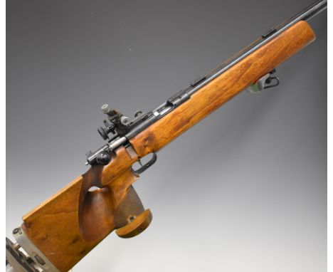 Anschutz Match 54 .22 bolt-action target rifle with shaped and textured thumb-hole grip, adjustable stock and trigger, scope 