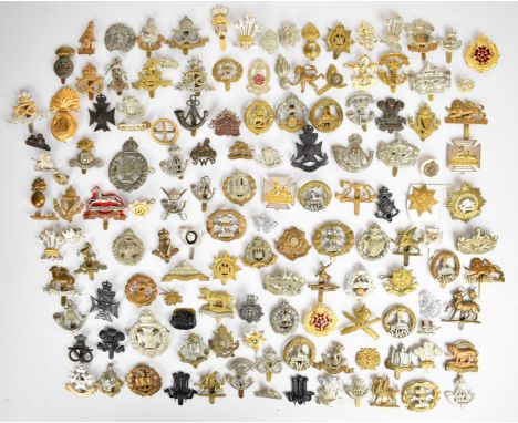 Large collection of approximately 100 British Army cap badges including Royal Sussex Regiment, Somerset Light Infantry, East 