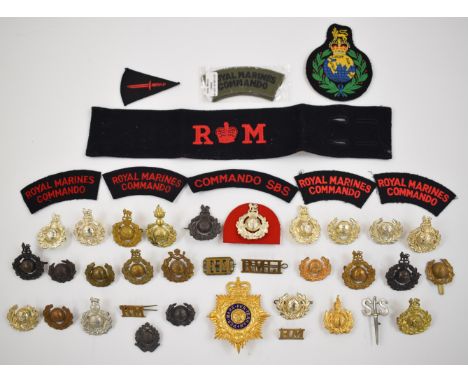 Collection of approximately 40 Royal Marines Commando badges including Light Infantry, Labour Corps and Artillery, metal, ano