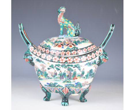 Chinese twin handled and footed pot pourri with figural decoration and Dog of Fo finial, height 22.5cm