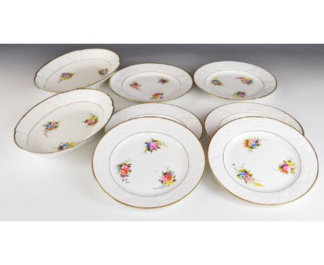 Spode dessert ware comprising two dishes and six plates with relief moulded dolphin borders and hand decorated with flowers, 