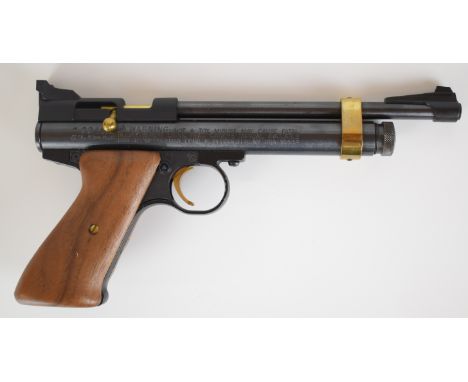 Crosman model 2240 .22 bolt-action CO2 target air pistol with shaped wooden grips and adjustable sights, serial number 610B07