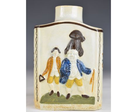 A late 18thC Prattware tea caddy with relief decoration of figures, probably King George III and Queen Caroline with attendan