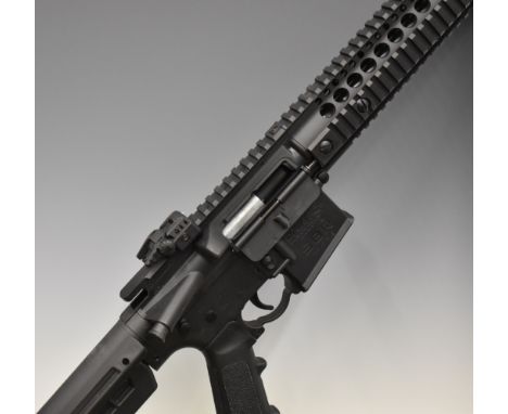 Crosman SBR .177 CO2&nbsp;assault style air rifle with textured pistol grip, tactical stock, multi-shot magazine and adjustab