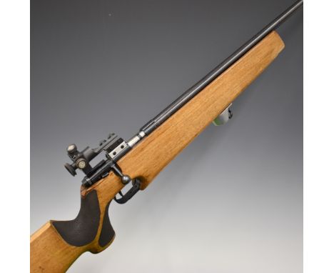 Companhia .22&nbsp;bolt-action target rifle with textured semi-pistol grip, raised cheek piece, sling mounts, adjustable butt