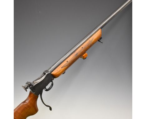 BSA .220 underlever-action target rifle with semi-pistol grip, raised cheek piece, sling mounts, BSA adjustable target sights