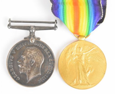 British Army WW1 medal pair comprising War Medal and Victory Medal named to 302921 Pte E Large, Manchester Regiment