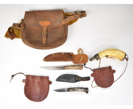 Leather Possibles bag with various hand made accessories including flint or bullet pouches, powder and primer horn flasks, pa