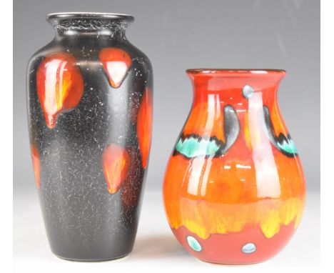 Two Poole Pottery vases, with orange glaze, tallest 21cm