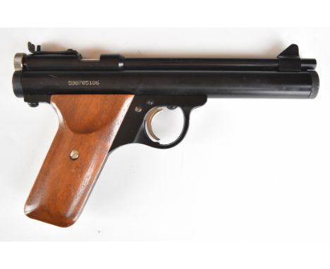 Benjamin Sheridan Model E9A .20&nbsp;CO2&nbsp;air pistol with wooden grip and adjustable sights, serial number 598705186.