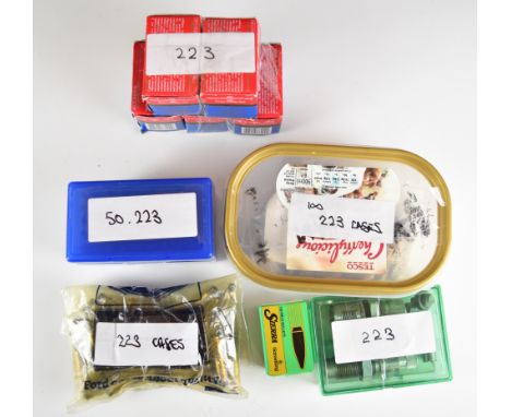 Over 130 .223 Remington rifle cartridges together with related .223 empty brass cases, re-loading dies and bullets. PLEASE NO