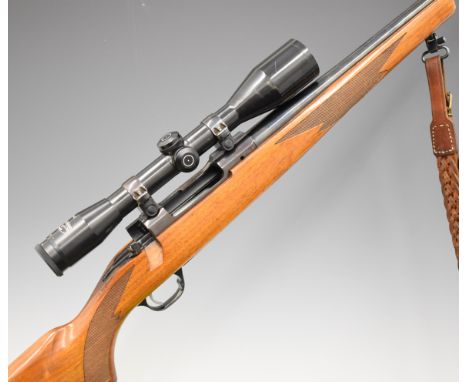 Ruger M77 Mark II .243 bolt-action rifle with chequered semi-pistol grip and forend, leather sling, Schmidt &amp; Bender 6x42