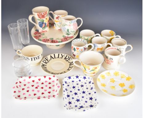 Emma Bridgewater ceramics including a tazza with pansy decoration, mugs, cups and saucers, glasses engraved 'Fizz' etc, talle