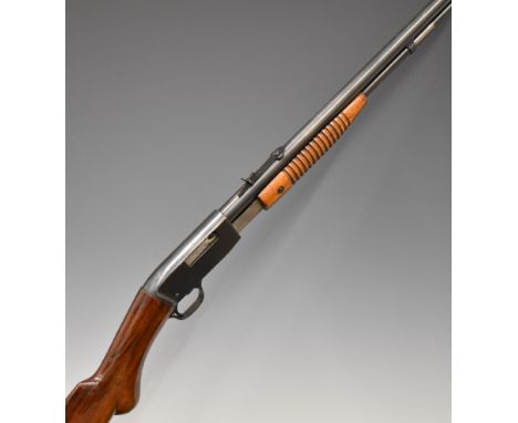 Browning .22 pump-action rifle with semi-pistol grip, adjustable sights and 21.5 inch barrel, overall length 99cm, serial num