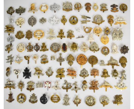 Large collection of approximately 100 British Army cap badges including Manchester 5th Volunteer Battalion, The Queen's Regim