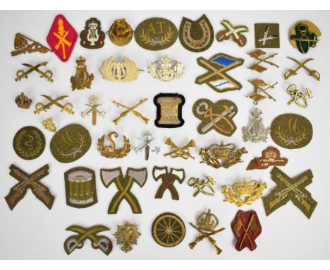 Collection of approximately 40 British Army metal and cloth proficiency / qualification badges including Physical Training In