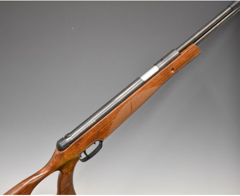 Remington Warhawk .177 under-lever air rifle with textured semi-pistol grip, raised cheek piece and sound moderator, NVSN.&nb