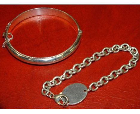 A SILVER BANGLE AND A BRACELET, APPROX WEIGHT 36.7 G