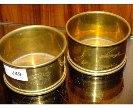 TWO BRASS COASTERS FROM THE STARLINE SHIPPING FIRST CLASS SERVICE
