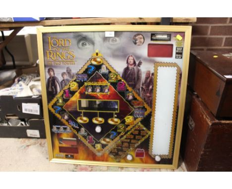 AN ILLUMINATING WALL HANGING THE LORD OF THE RINGS FRUIT MACHINE GAME DISPLAY OVERALL SIZE - 66CM X 68CM 