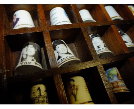 A COLLECTION OF CERAMIC THIMBLES