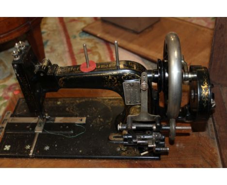 A CASED VINTAGE FRISTER &amp; ROSSMANN SEWING MACHINE - CASE BROKEN