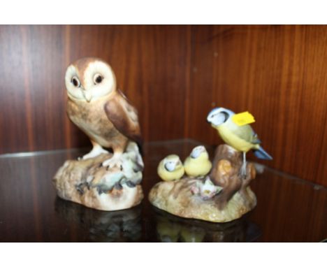 A ROYAL CROWN DERBY MATT FINISH OWL FIGURE TOGETHER WITH A ROYAL CROWN DERBY BLUE TIT AND CHICKS FIGURE GROUP (2)