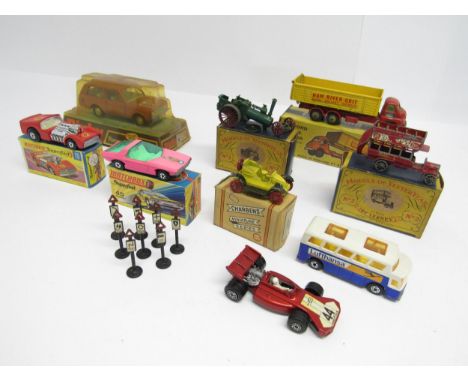 A mixed group of boxed diecast vehicles to include Dinky Toys 192 Range Rover on card stand with intact plastic bubble (yello
