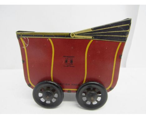 A Wells Brimtoy litho-printed tinplate pram, 10cm tall (missing handle)