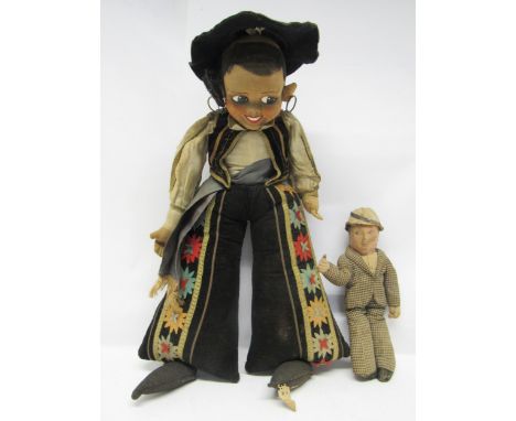 A 1930s Farnell Alpha Toys Spanish Gypsy with moulded brushed cotton face with painted features, metal hoop earrings, black h
